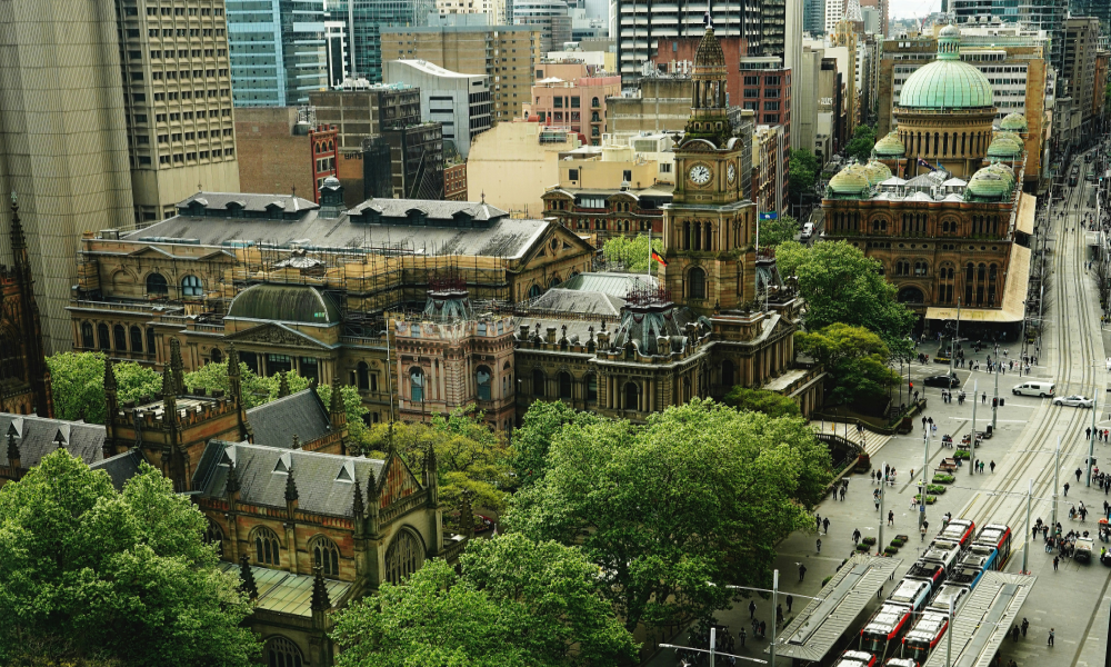 Image of George Street, Sydney, with trams outside the town hall  